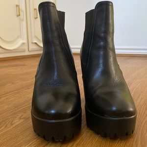 Ankle length booties with 4 inch heels. Size 37